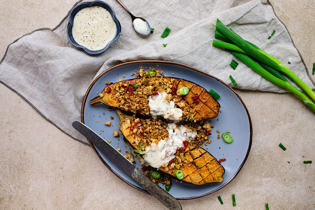 Baked miso aubergine with quinoa, sesame seeds and spring onions