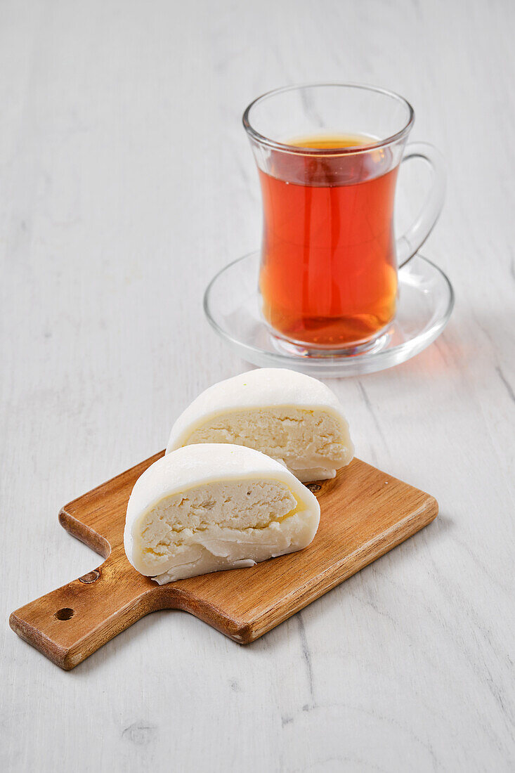 Mochi with grated coconut and fruit tea