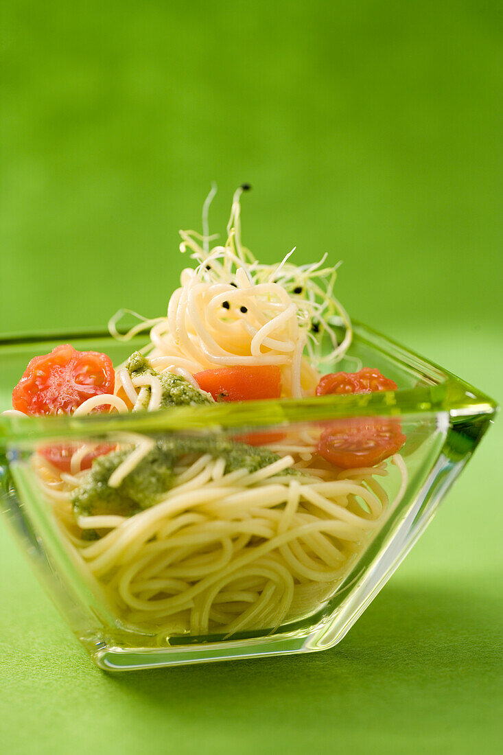 Spaghettini with tarragon pesto and cherry tomatoes