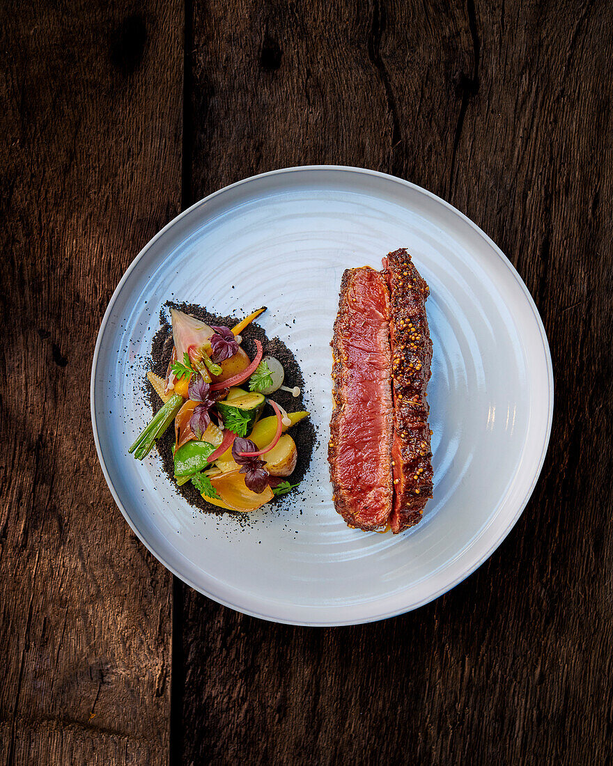 Black Angus steak with vegetables and chimichurri