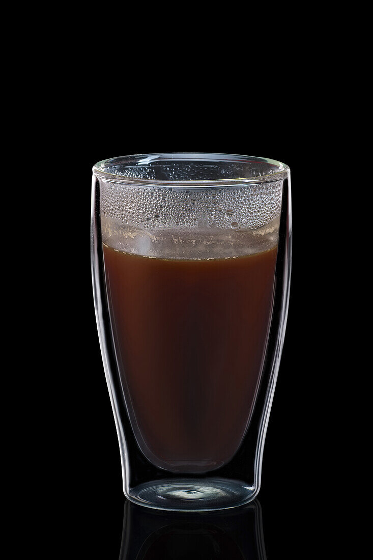 Hot coffee in a double-walled glass
