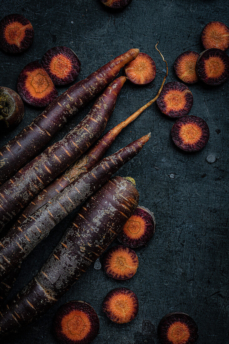 Purple haze carrots, whole and sliced