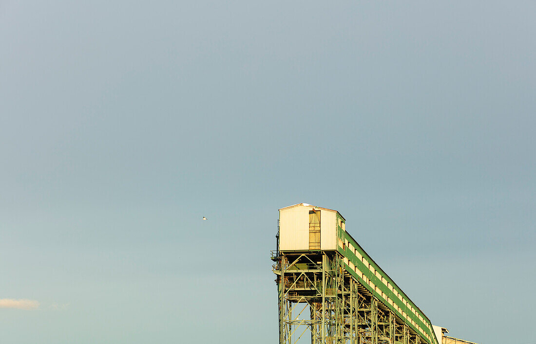 Grain elevator against blue sky, North Vancouver, British Columbia, Canada