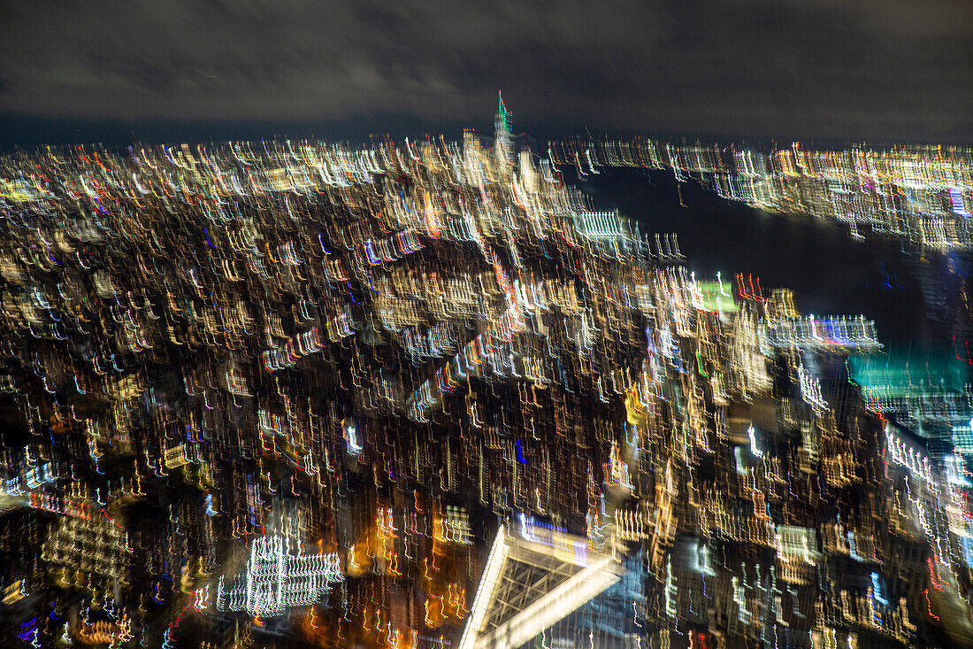 Blurred cityscape at night, New York City, New York, USA