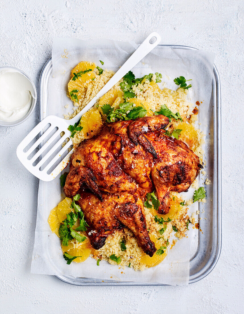 Butterfly chicken with harissa and orange couscous