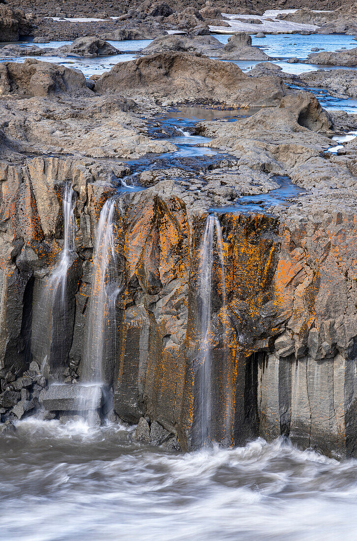 Iceland. Columnar basalt designs along the Skjalfandafljot River in the Bardardalur Valley.