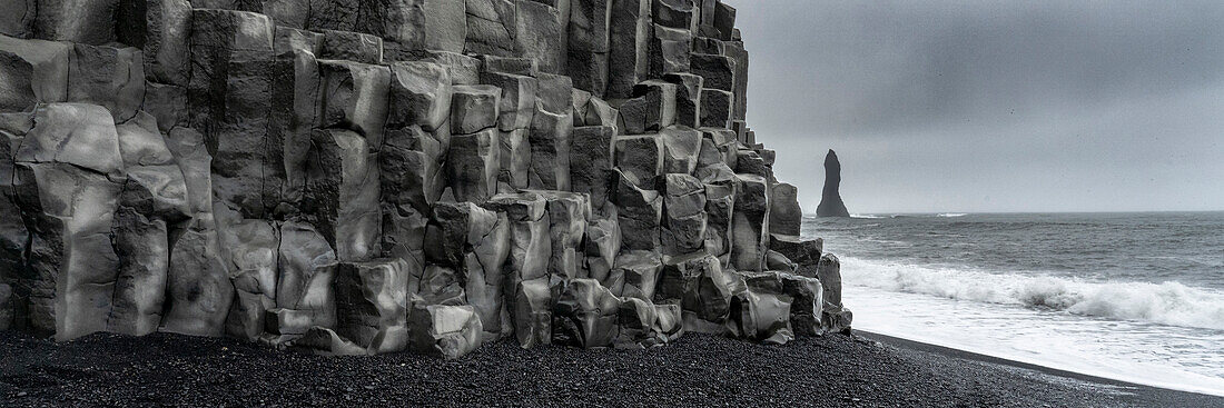 Iceland. Columnar basalt cliffs of Reynisfjara, Ring Road.