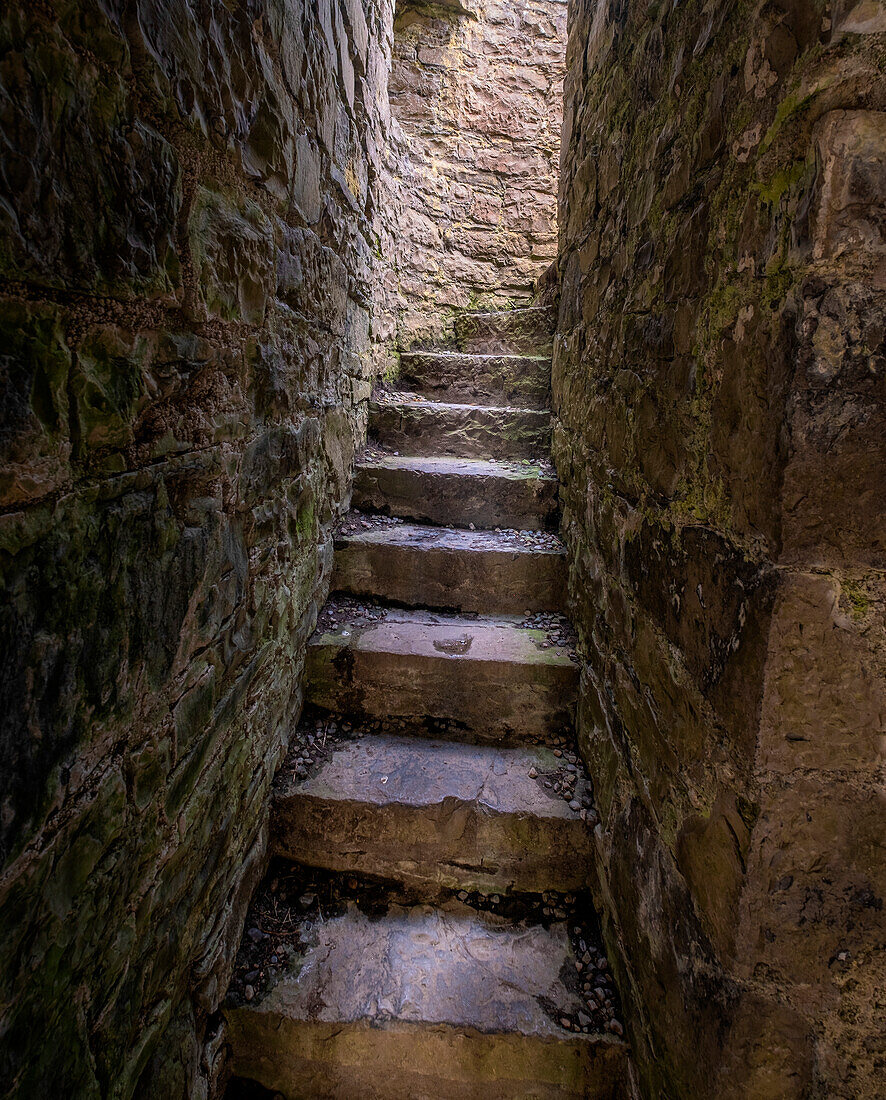 Ancient steps lead to a roofless second floor room.