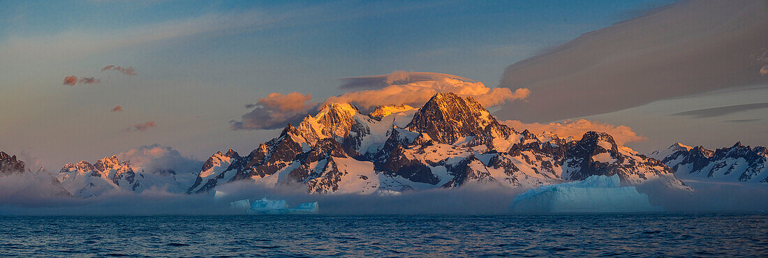 South Georgia Island. Panoramic of icebergs, cloud, mountain and ocean, Drygalski Fiord