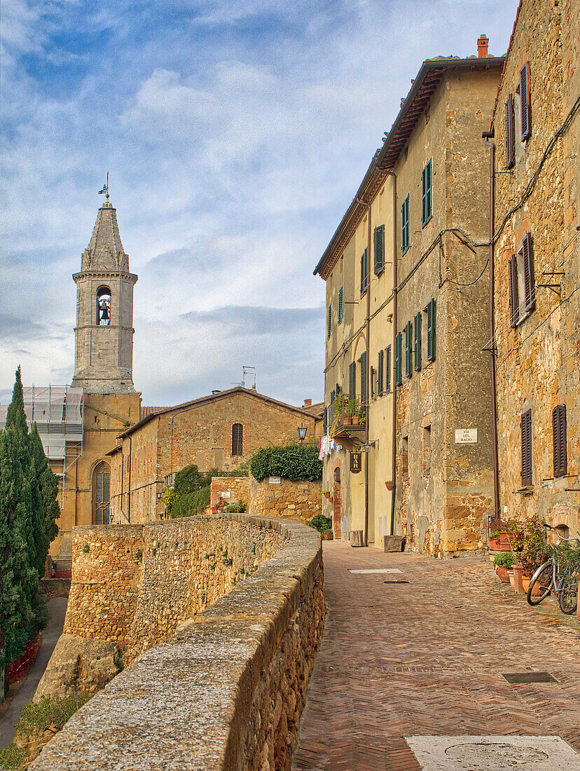 Italy, Tuscany, Pienza. Walkway leading to the bell tower of the Pienza cathedral.