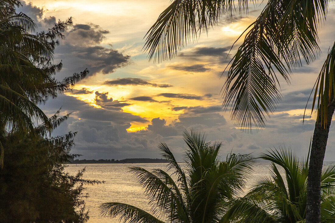 French Polynesia, Moorea. Sunset on island and ocean.