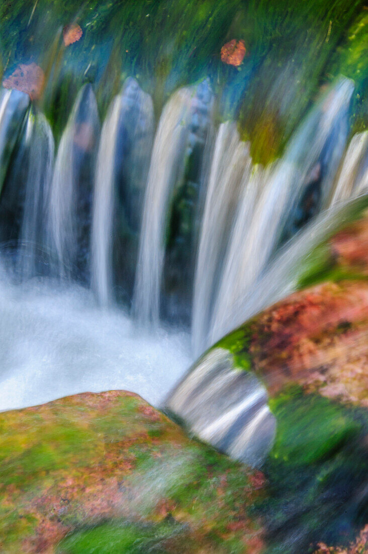 Sweden, Dalarna County, Fulufjallet National Park. Small stream flowing over rock ledges.