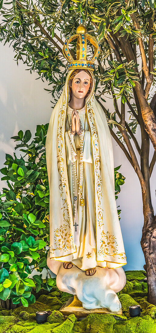 Mary statue, Saint Augustine, Florida. Mary appearing to peasant children in Fatima, Portugal. Mission founded 1565