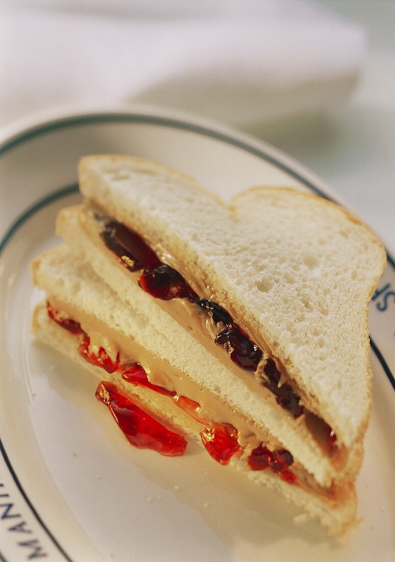 Two Peanut Butter Sandwiches with Assorted Jelly