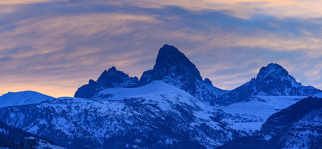 USA, Wyoming. Panoramic sunset of Grand Teton and clouds from west side of Tetons