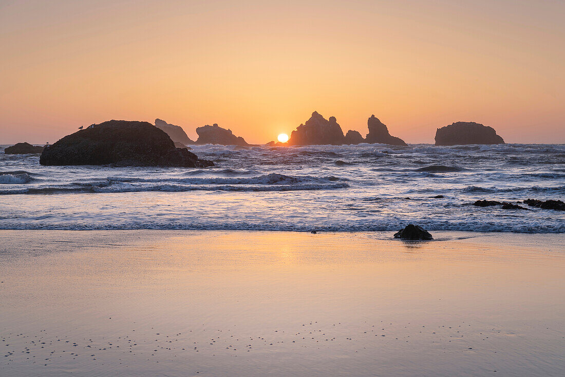 Sunset on Bandon Beach at low tide, Bandon,, Oregon