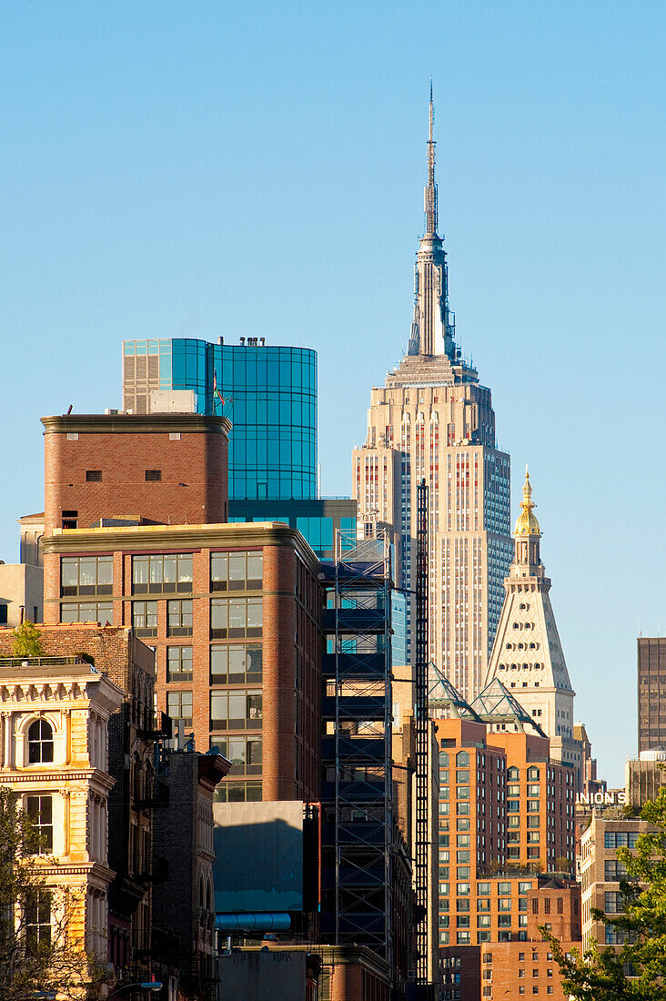 Views Of The Empire State Building From Bowery; Manhattan, New York, Usa