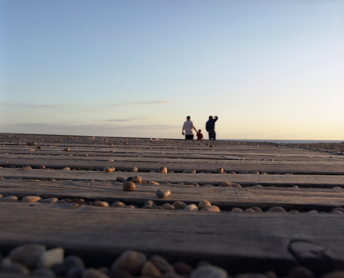 People On Beach Boardwalk