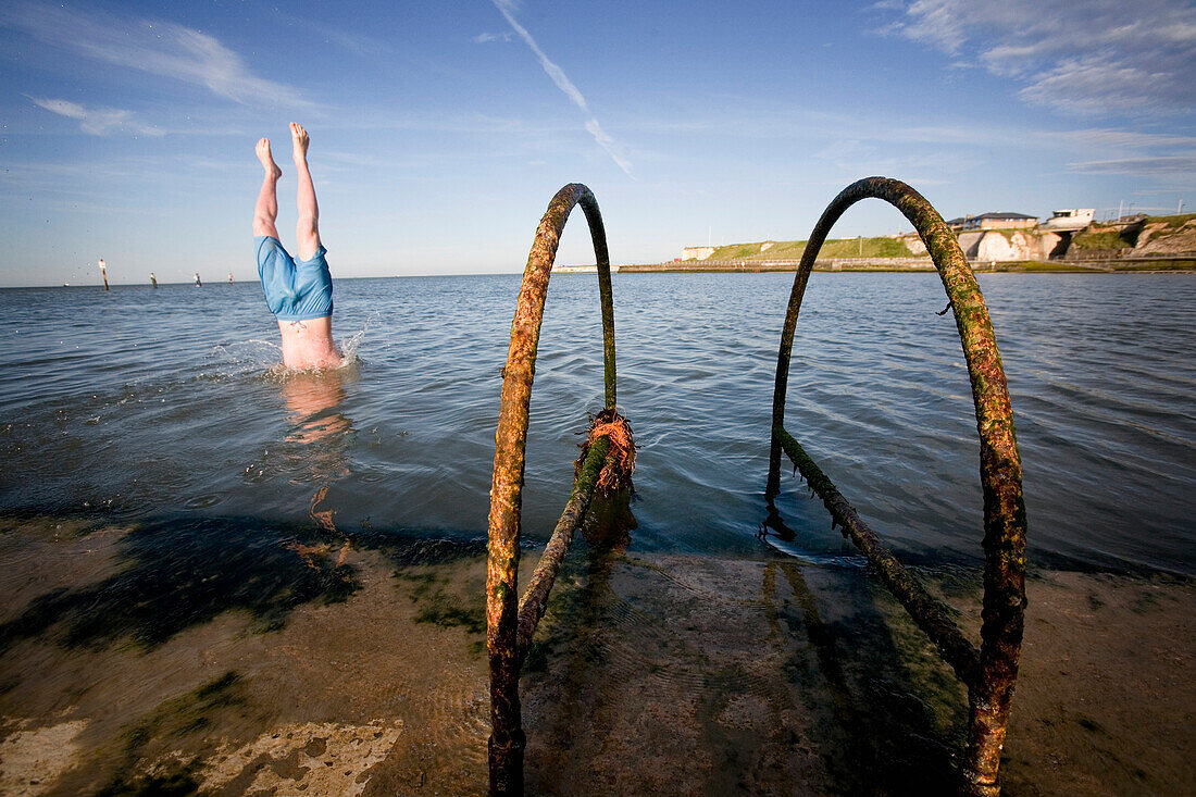 Local Kids Dive From The Wall