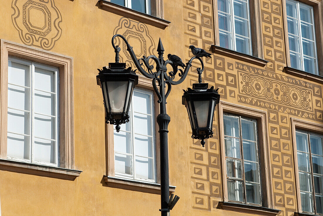 Detailed facades on burgher houses in Zamkowy Square (Plac Zamkowy) which were rebuilt after the Second World War and now form the UNESCO World Heritage Site Old Town district of Warsaw, Poland