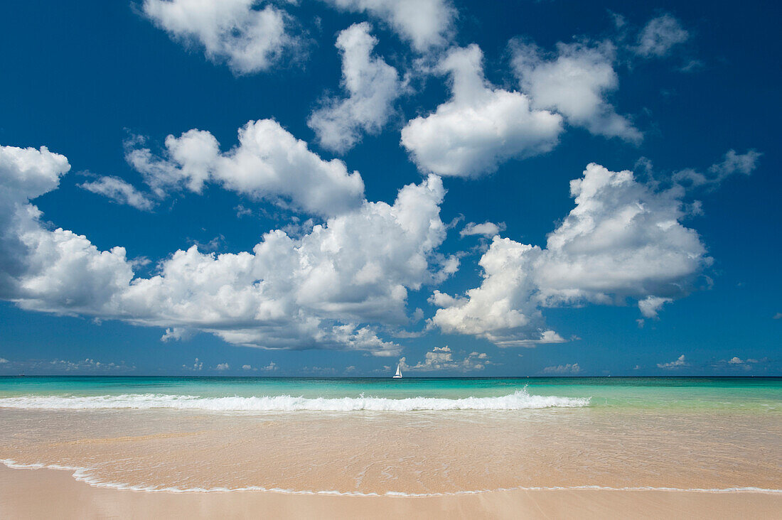 Yacht In The Distance Off The West Coast Of Barbados; Barbados