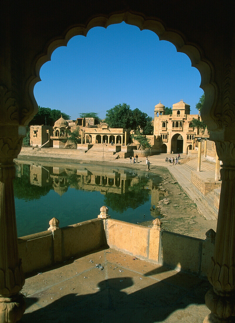 Gadisar Lake and Gateway seen through scalloped arch, Jaisalmer, Rajasthan, India, Gadisar Lake and Gateway seen through scalloped arch, Jaisalmer, Rajasthan, India (c) Sue Carpenter/Axiom.