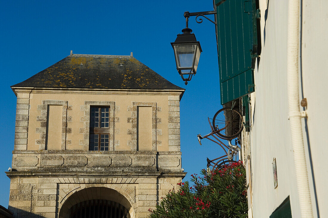 Low Angle View Of A Building And Lamp In Saint Martin De Re On Iie De Re; Poitou-Charentes, France