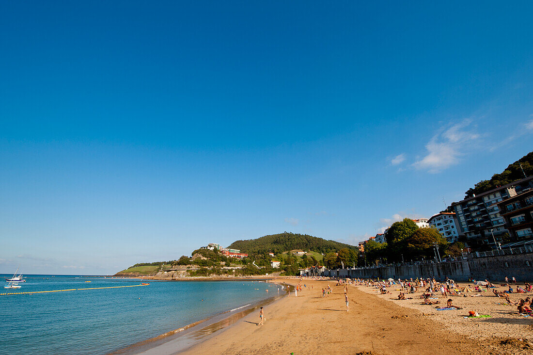 Sunbathing On The Beach, Lekeitio, Basque Country, Spain