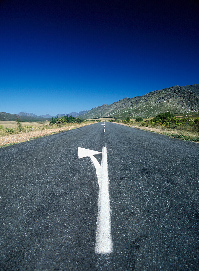 Arrow Road Marking In The Little Karoo Near Garcia, Western Cape, South Africa.