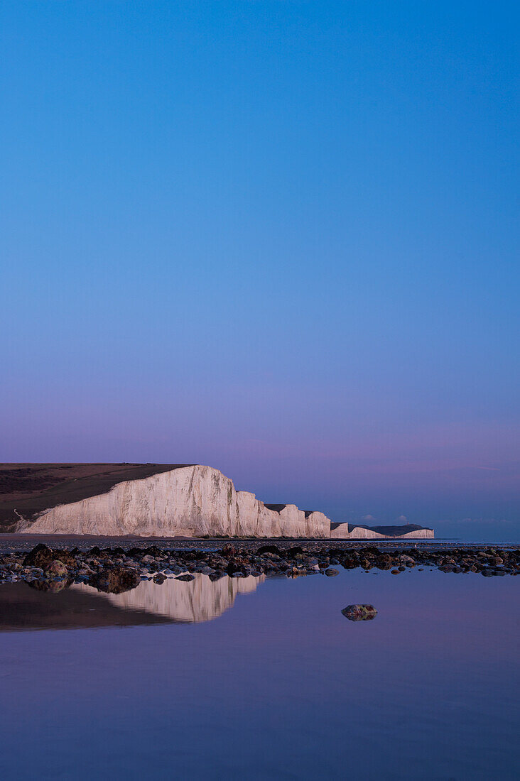 White Cliffs Of The Seven Sisters National Park At Dusk, East Sussex, Uk