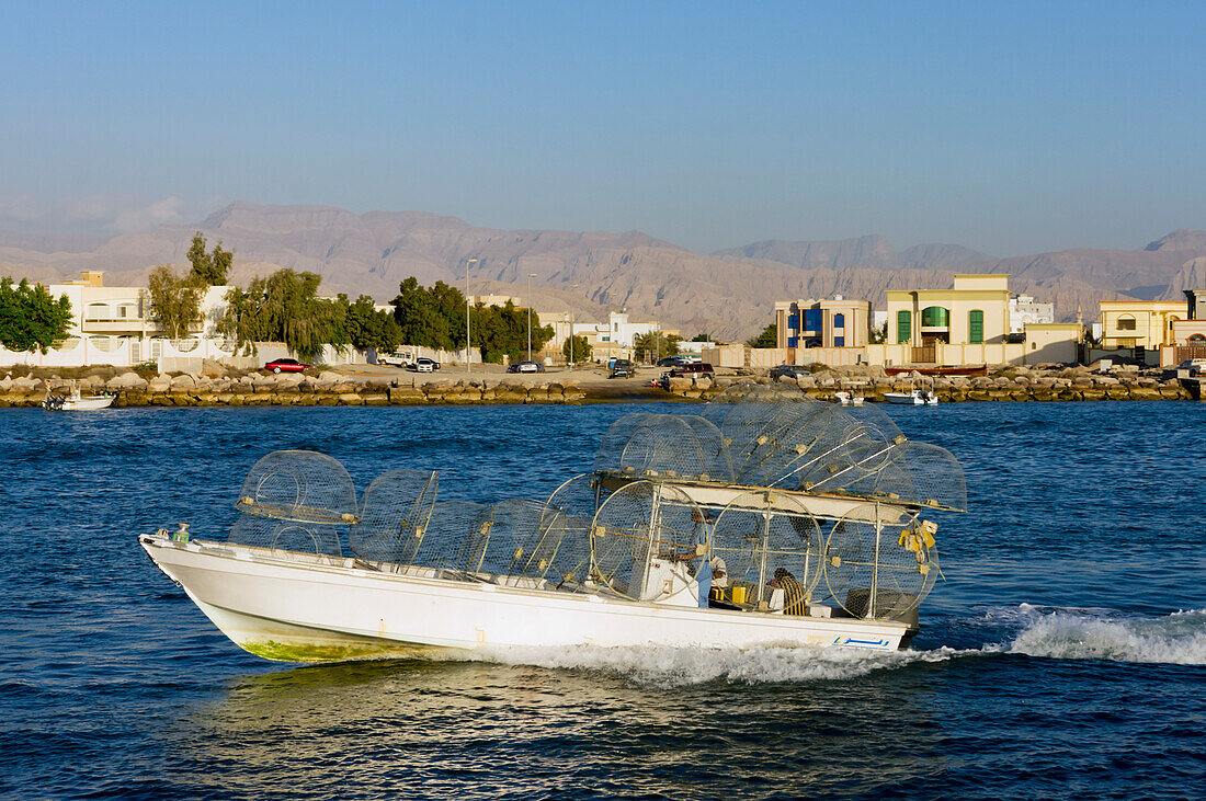 United Arab Emirates, Fishing boat leaving harbour; Ras Al Khaimah