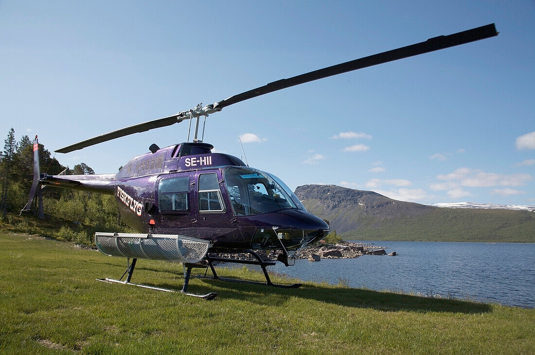 Sweden, Lappland, Helicopter transfer for fly fishing trip; Stora Sjofallet National Park