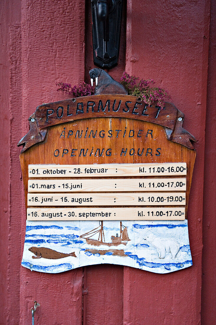 Detail Of The Opening Hours Sign Outside The Polar Museum; Tromso, Norway