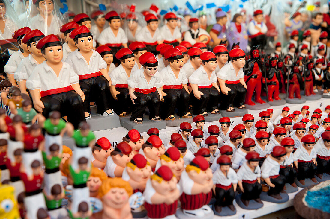 Catalan Nativity Character Known As Caganer In Santa Llucia Christmas Market, Barcelona, Spain