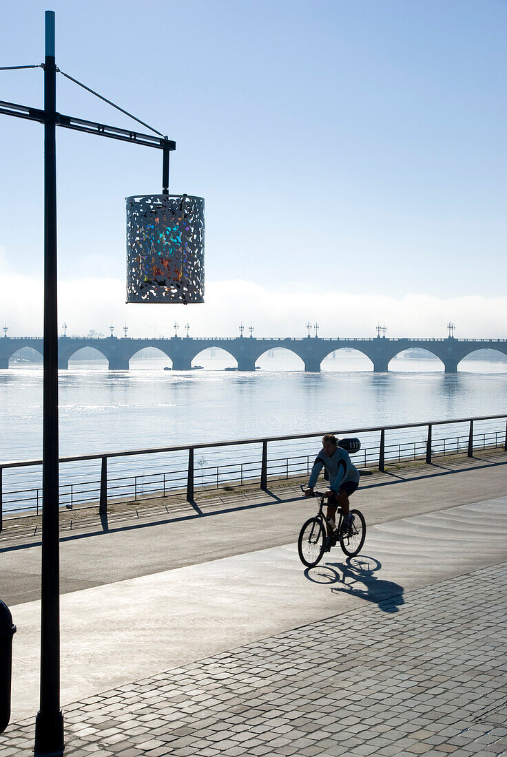 Europe, France, Bordeaux, riverside gironde cyclist