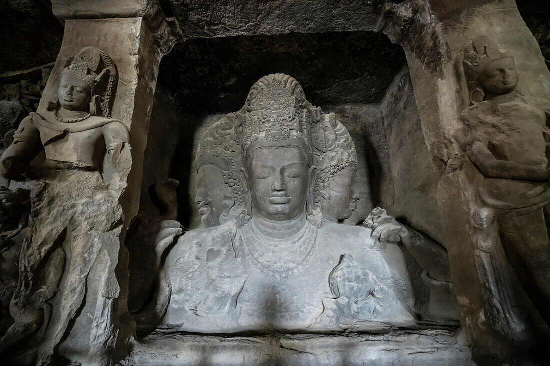 Three headed Maheshmurti depicting Shiva as the Creator, Protector and Destroyer in the Elephanta Caves, in Back Bay off Mumbai; Mumbai, Bombay, India