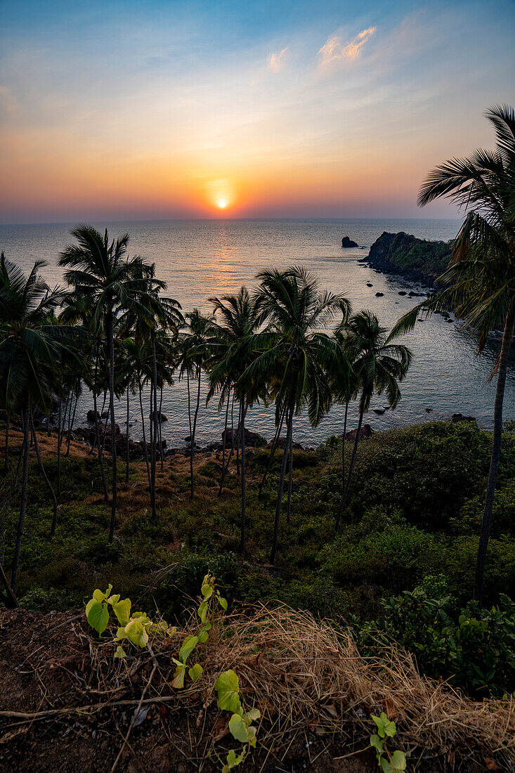 Sunset over the Arabian Sea from Cabo Serai over Cabo de Rama Beach; Cabo de Rama, Goa, India