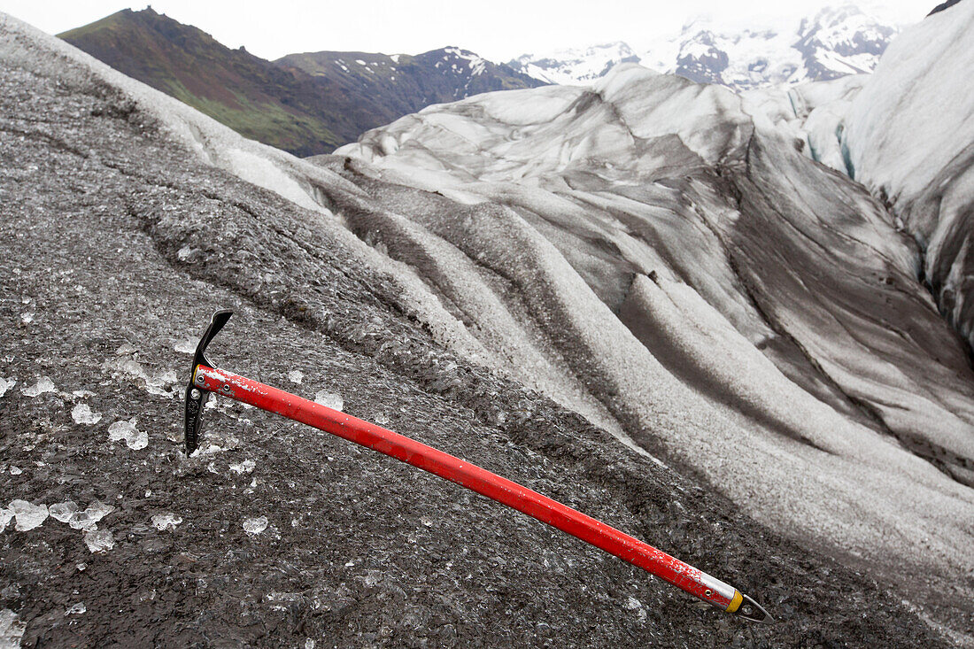 Ice axes are stuck in Skaftafell Glacier.; Skaftafell National Park, Iceland