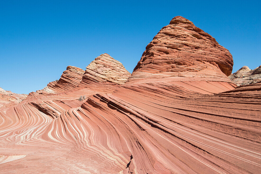 Pyramid shaped sandstone rock formations at Coyote Buttes North, part of the Paria Canyon-Vermilion Cliffs Wilderness area.