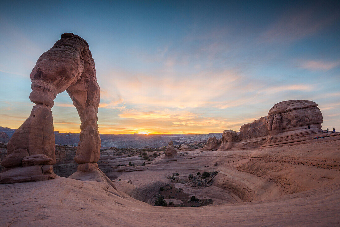 Sunset at Delicate Arch, located in Arches National Park, Utah.