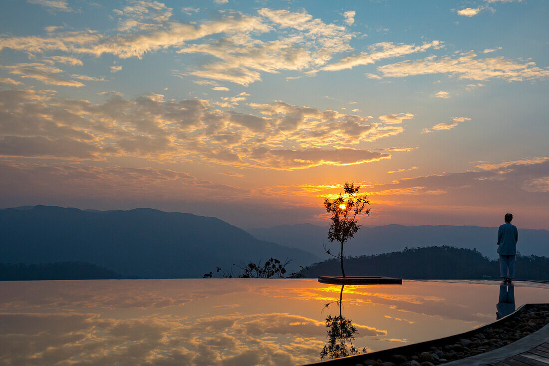 Prakriti Shakti Naturopathy Retreat with infinity pool at dawn; Kochi, Kerala, India