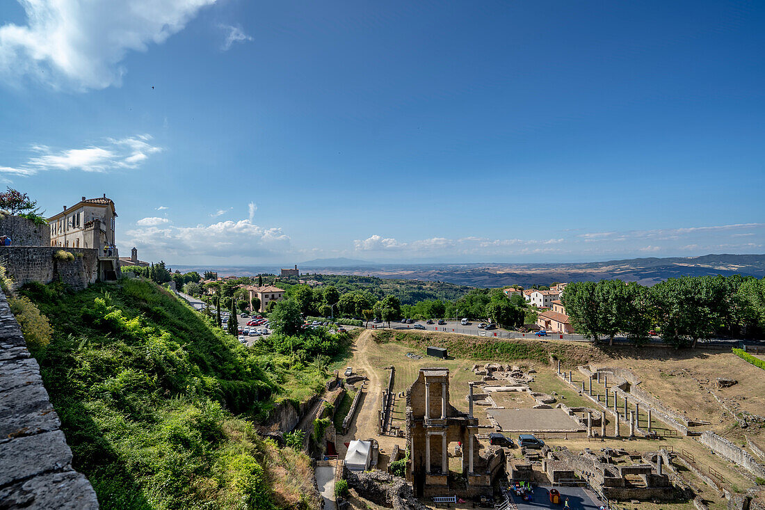 Overview of the historic old town of Volterra and the Roman ruins of the Etruscan Acropolis; Volterra, Tuscany, Italy