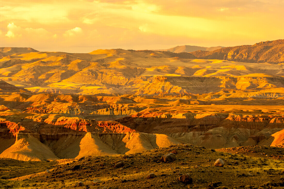 Golden sunset over the vast rock formations in the Wyoming Badlands, East of Dubois; Wyoming, United States of America
