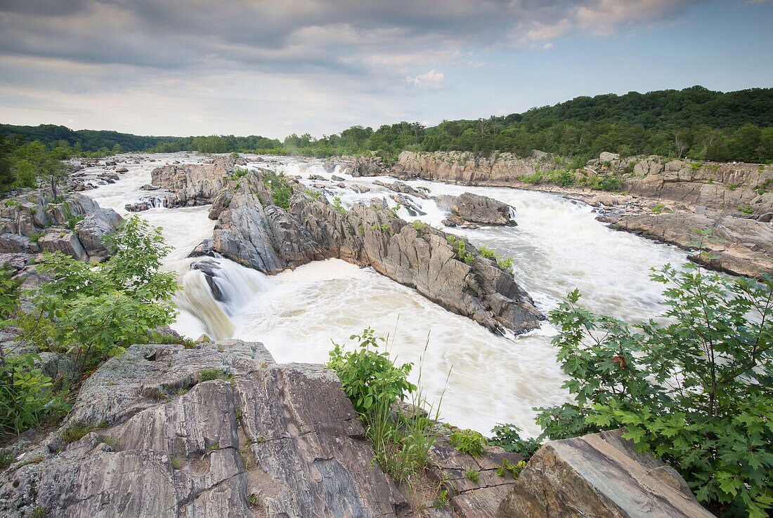 The Potomac River surges through a rocky gorge at Great Falls.