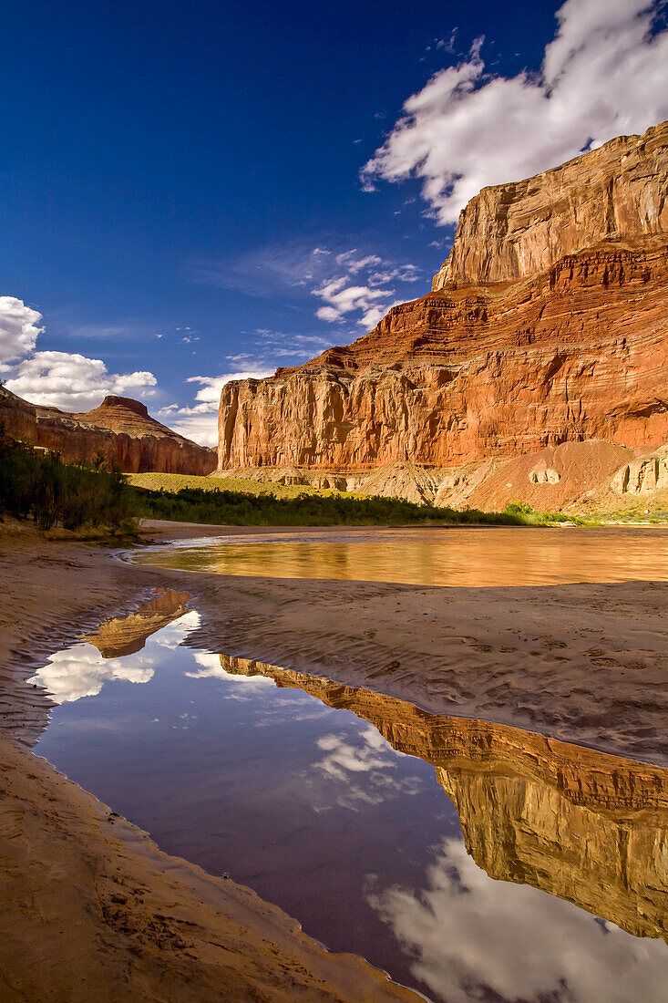 Reflection in calm waters of Nankoweap Canyon.
