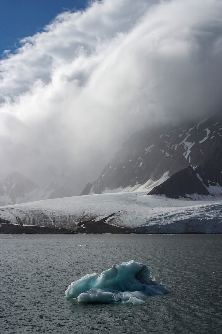 Clouds over mountains in Hornsund, Spitsbergen, Svalbard, Norway.