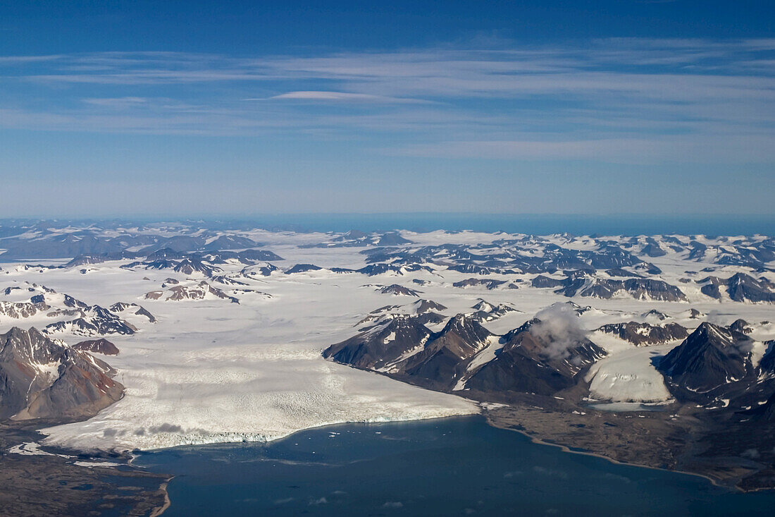 Aerial of tidewater glacier and fjord, Spitsbergen, Svalbard, Norway.