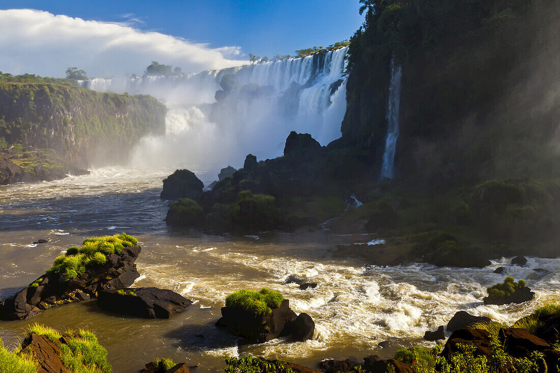 Scenic view from the bottom of Iguazu Falls waterfall.