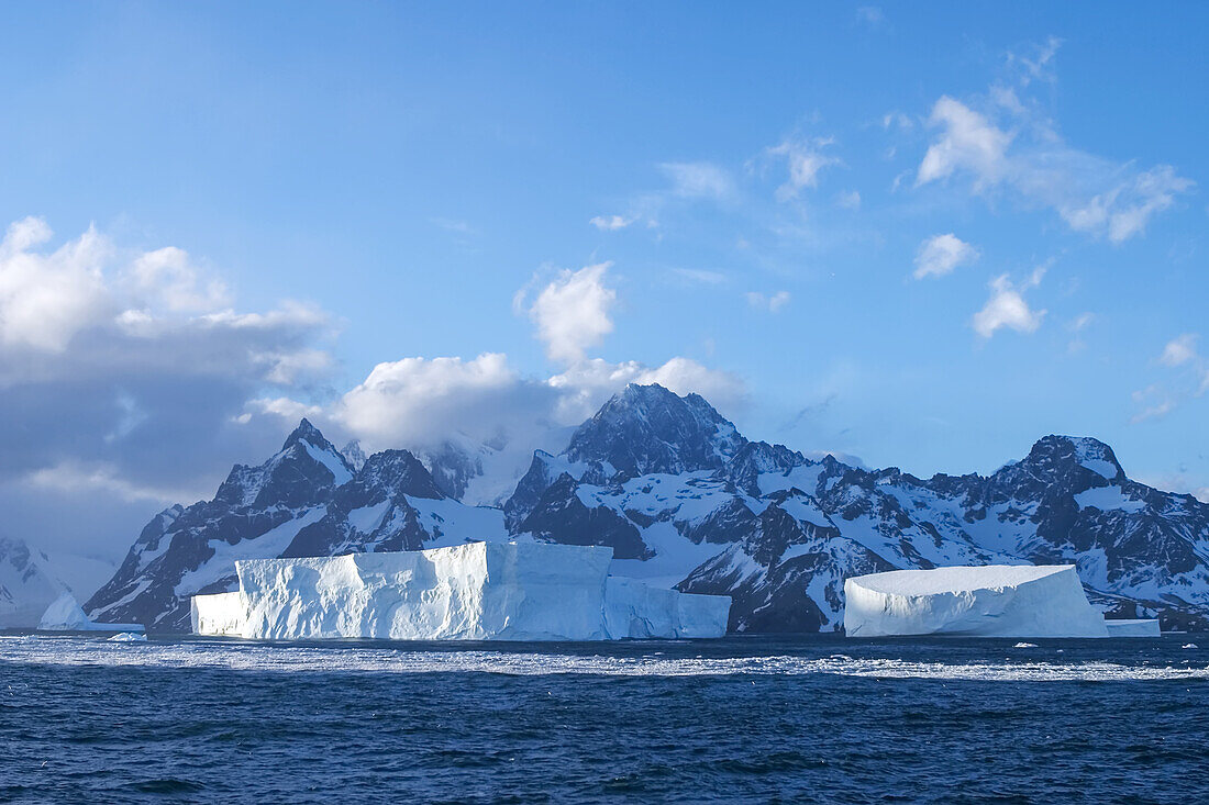 Tabular icebergs off the shore near Cape Disappointment.