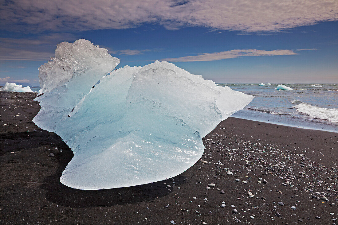 An iceberg beached after coming from the Vatnajokull icecap, Iceland.; Jokulsarlon, Vatnajokull icecap, Iceland.